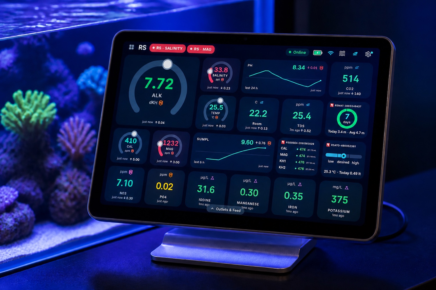 Cora Max large-format reef controller displaying a live dashboard beside a reef aquarium